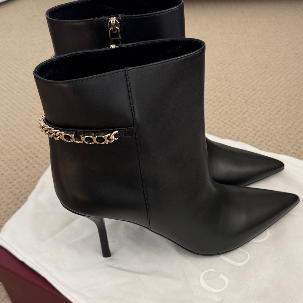 NIB-Gucci Black Heeled Boots with Gold Chain
Size 41